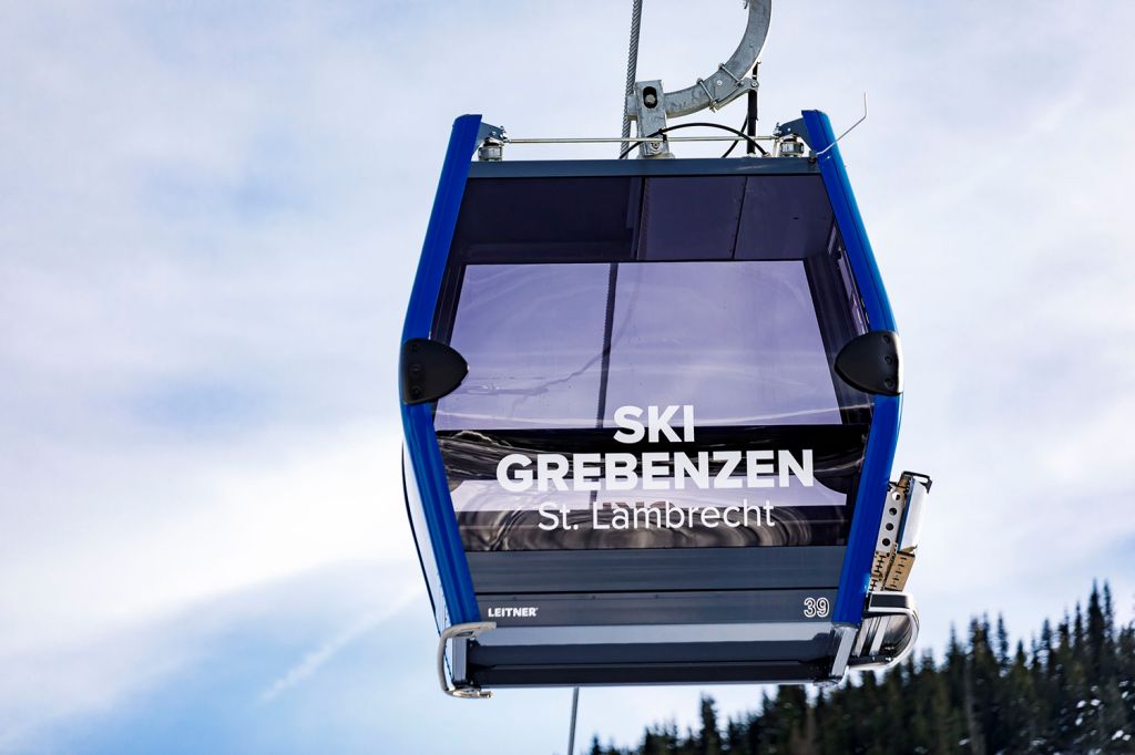 Greben10 Gondelbahn - Über insgesamt 55 Gondeln verfügt die neue Bahn, die auf einer Länge von satten 2,8 km insgesamt etwa 2.100 Personen pro Stunde und Richtung transportieren kann. Die Bahn stammt vom südtiroler Seilbahnhersteller Leitner. - © Mediahome Werbeagentur Greben10 Gondelbahn - Über insgesamt 55 Gondeln verfügt die neue Bahn, die auf einer Länge von satten 2,8 km insgesamt etwa 2.100 Personen pro Stunde und Richtung transportieren kann. Die Bahn stammt vom südtiroler Seilbahnhersteller Leitner. - © Mediahome Werbeagentur