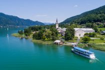 Die Schifffahrt auf dem Ossiacher See - hier am Stift Ossiach.  • © Schifffahrt Region Villach Tourismus GmbH, Fotograf: Michael Stabentheiner