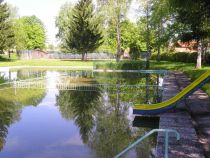 Das Naturschwimmbad Wette in Roßhaupten.  • © Tourist-Information Honigdorf Seeg