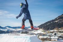 Unterwegs auf dem Snowboard in Westendorf. • © SkiWelt Wilder Kaiser - Brixental - Dietmar Denger