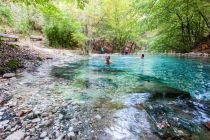 Ein warmes Bad im Maibachl in Villach. • © Region Villach Tourismus, Michael Kainz