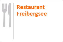 Der Freibergsee mit dem Naturbad und dem Restaurant. • © Norbert Wildhausen auf pixabay.com